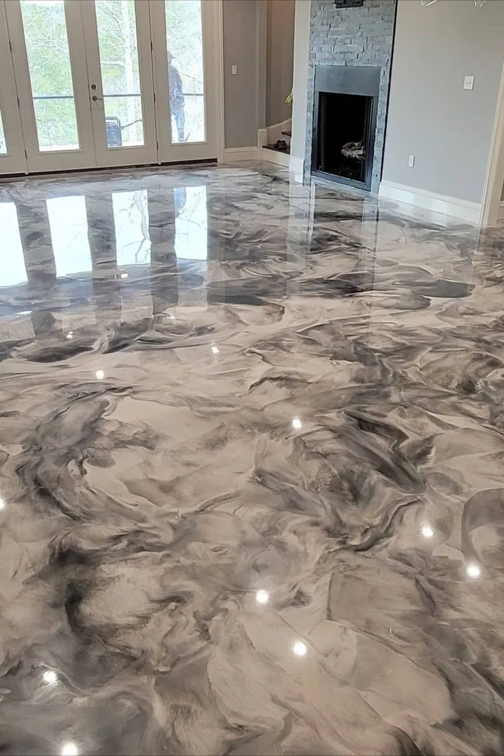 Sala residencial con piso epóxico efecto mármol gris y blanco